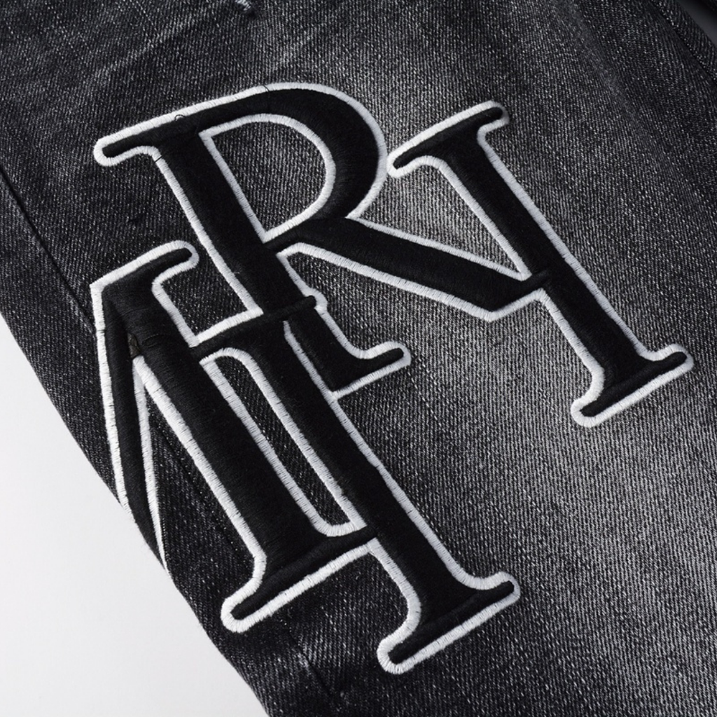 Amr Staggered Black Jeans