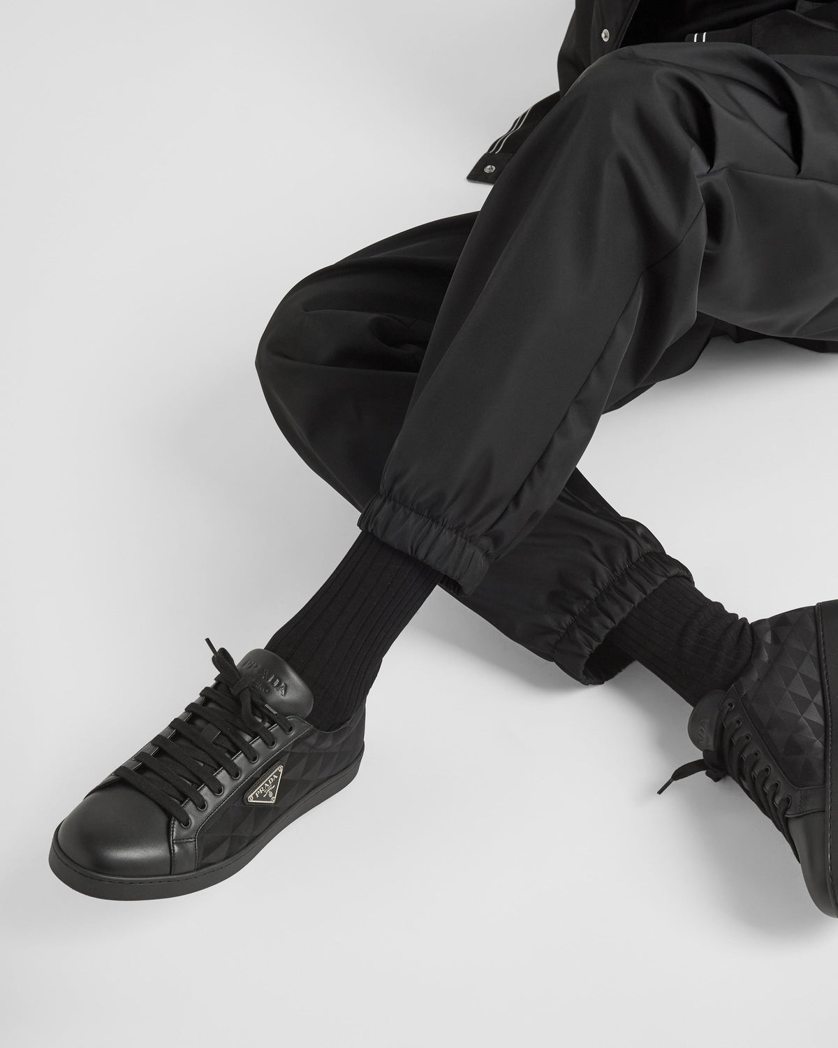 Sneaker aus Leder und Re-Nylon